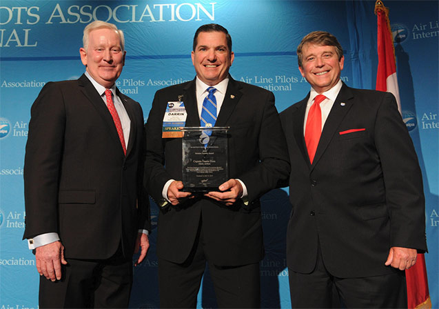 Captain Darrin Dorn (ALA, center) receives the 2014 Aviation Security Award from Captain Canoll and Captain Fred Eissler.