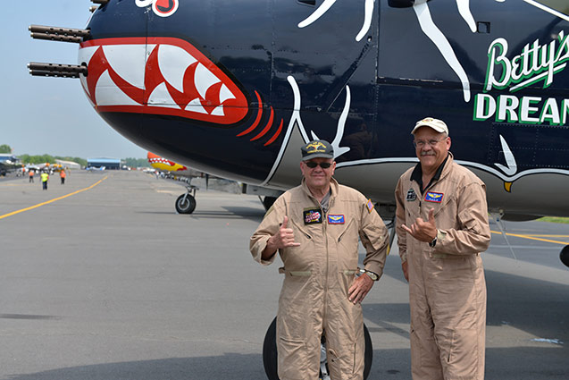 Alan Miller (right) and his dad with B-25 Mitchell bomber, Betty’s Dream